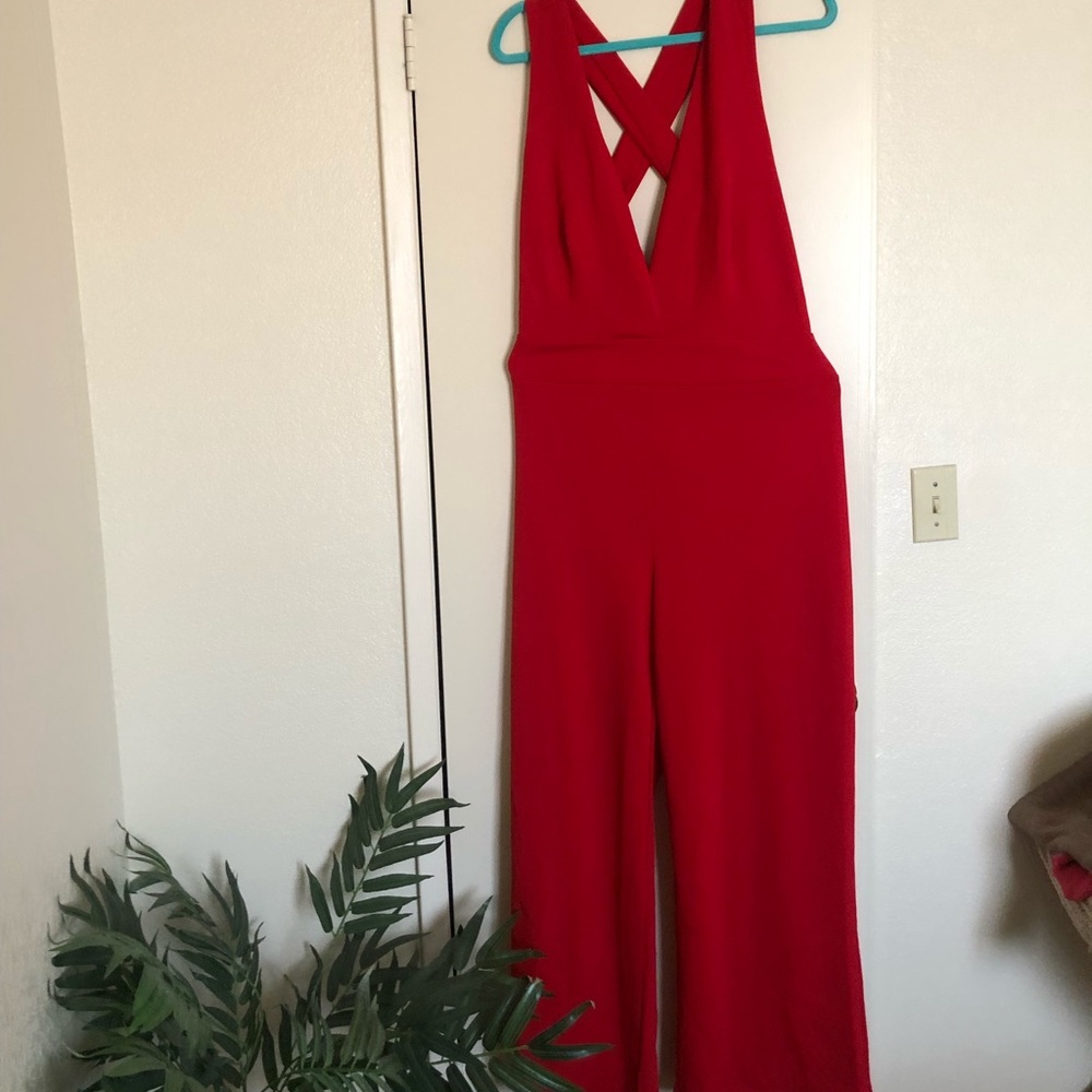 Plus size plunging front and cross back jumpsuit